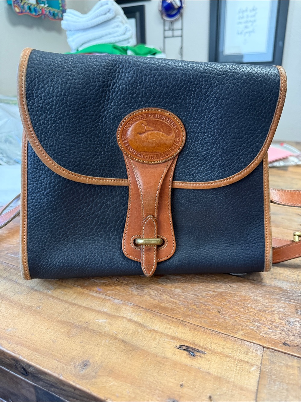 Dooney & Bourke Black with Brown Trim Pebble Leather Messenger